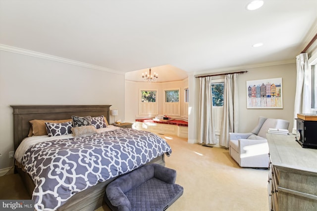 bedroom featuring light colored carpet, an inviting chandelier, and crown molding