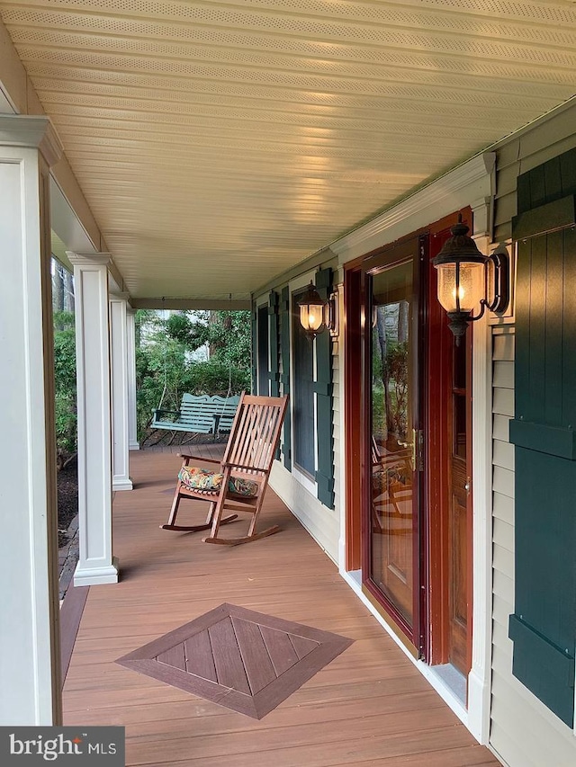 deck featuring covered porch