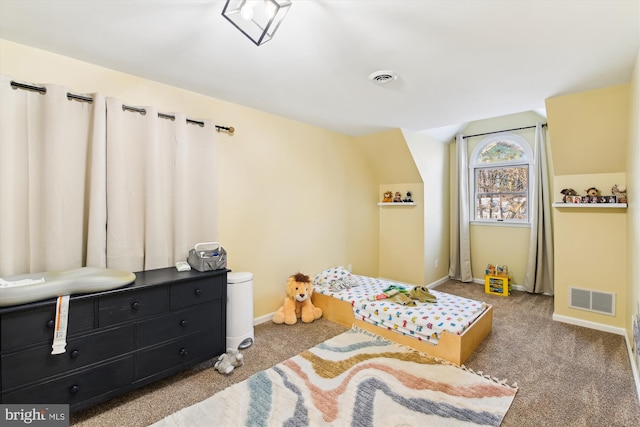 bedroom with light colored carpet