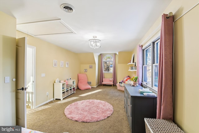 playroom featuring a chandelier and light colored carpet