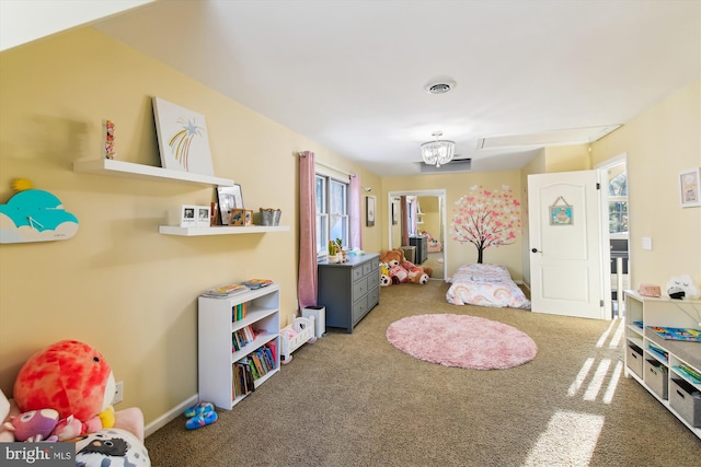 recreation room with carpet flooring