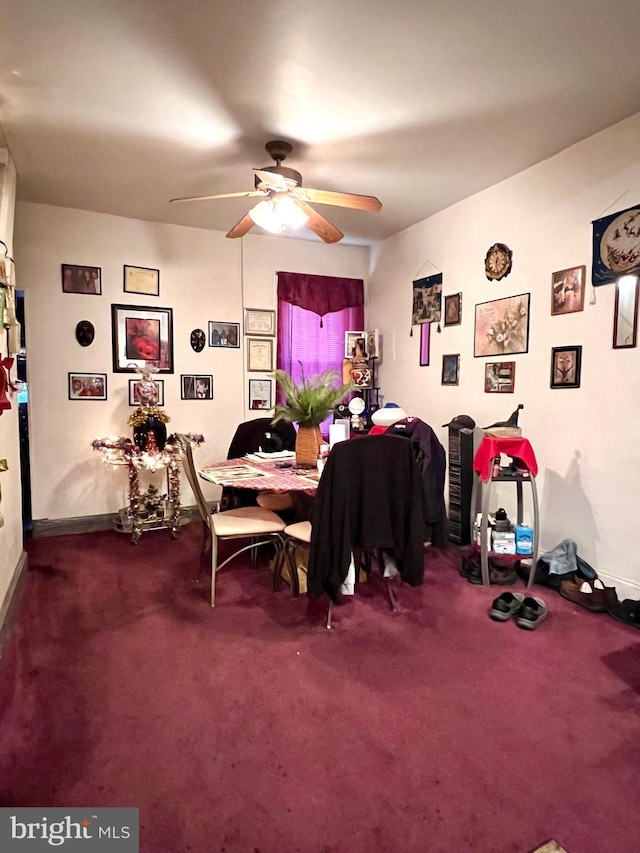 dining room with carpet and ceiling fan