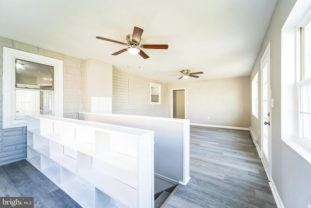 interior space featuring ceiling fan