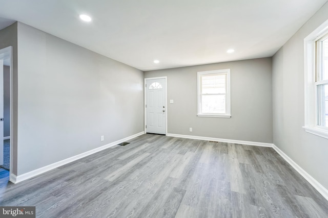 empty room featuring wood-type flooring