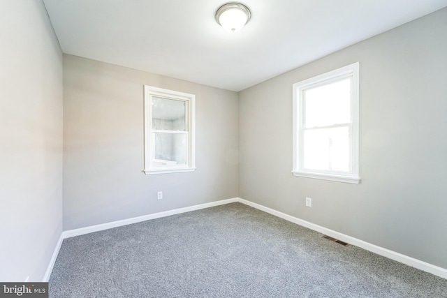 empty room featuring carpet