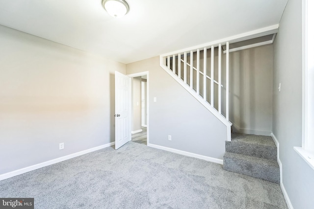 staircase with carpet