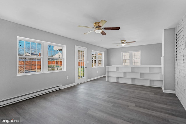 unfurnished living room with baseboard heating, ceiling fan, and dark wood-type flooring