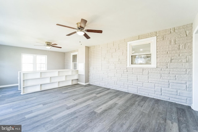 empty room featuring wood-type flooring