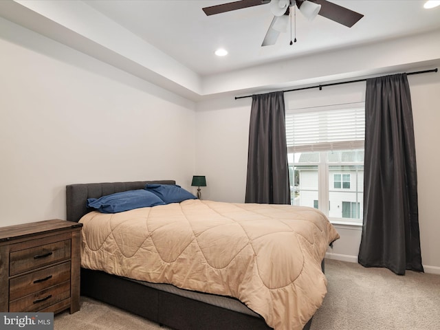 carpeted bedroom featuring ceiling fan