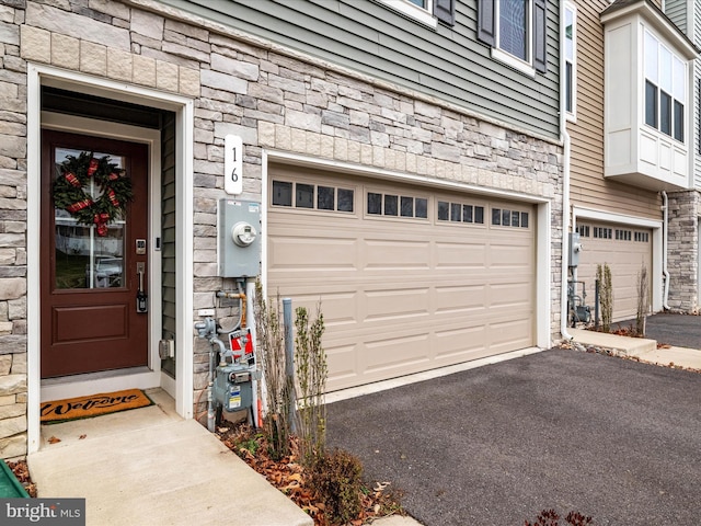 entrance to property with a garage