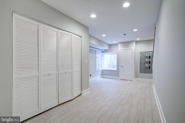 hallway featuring light hardwood / wood-style flooring