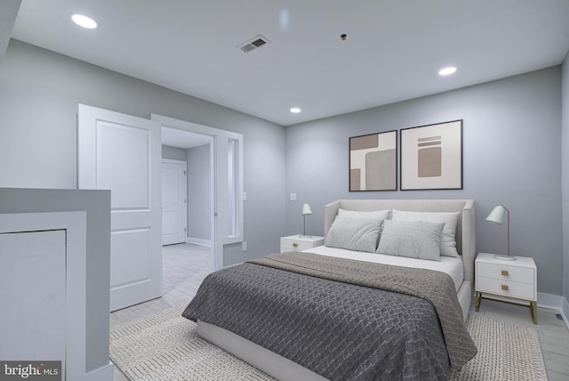 bedroom featuring light wood-type flooring