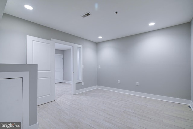 unfurnished room featuring light wood-type flooring