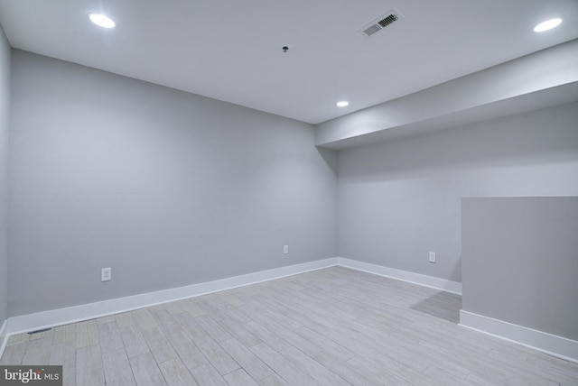 empty room with light wood-type flooring