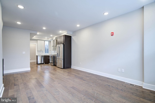 unfurnished living room featuring light hardwood / wood-style floors