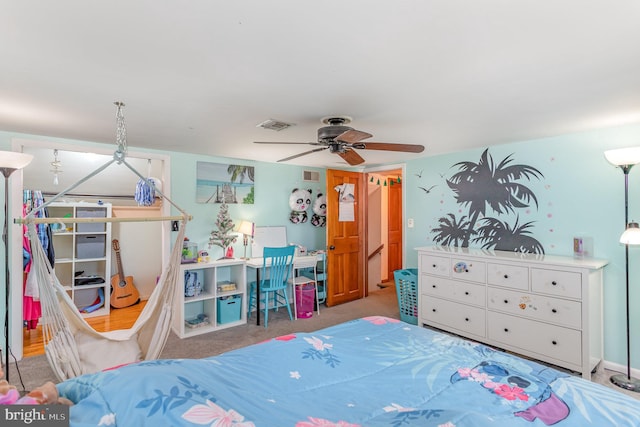 bedroom with light carpet and ceiling fan