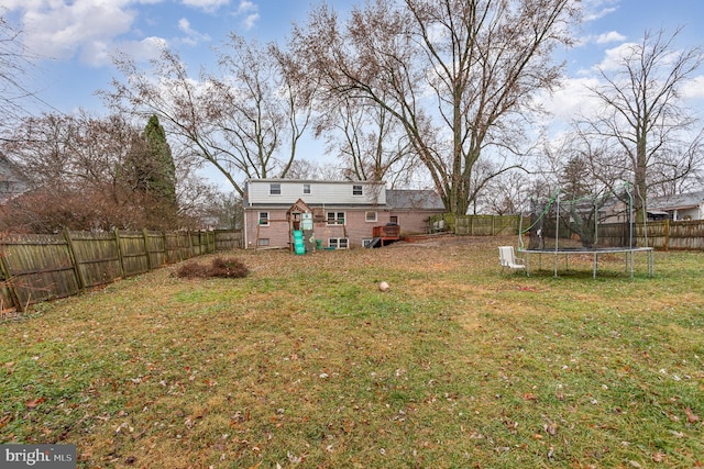 view of yard with a trampoline