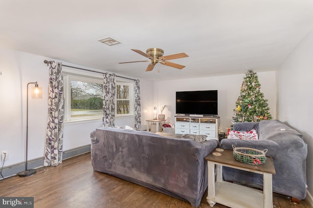 living room featuring ceiling fan and wood-type flooring