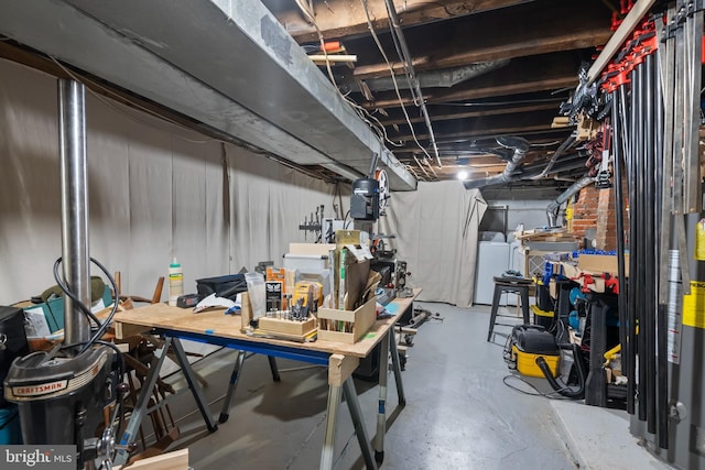 basement featuring washing machine and clothes dryer