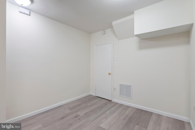 basement with light wood-type flooring