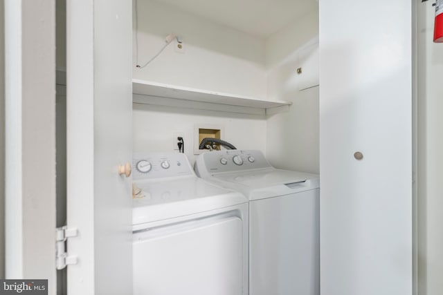 laundry area featuring washing machine and dryer