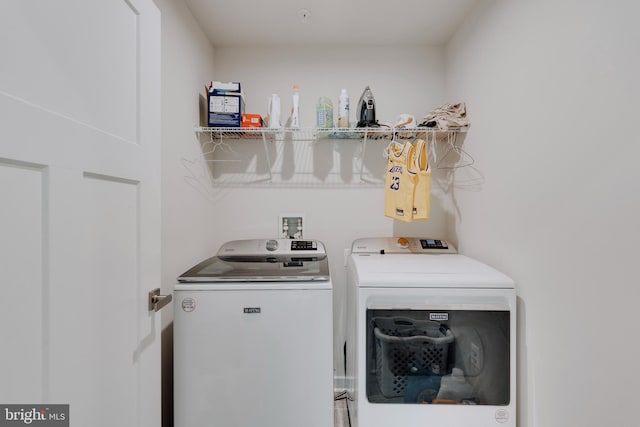 laundry room featuring independent washer and dryer