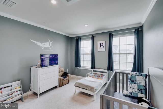 carpeted bedroom with crown molding