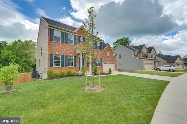 view of front of property with a garage, cooling unit, and a front yard