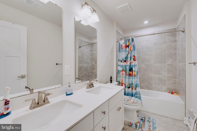 full bathroom with tile patterned flooring, vanity, toilet, and shower / tub combo with curtain