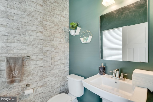 bathroom with sink and toilet