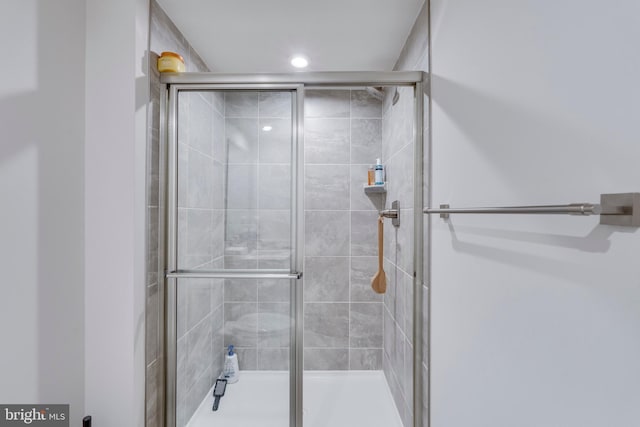 bathroom with an enclosed shower