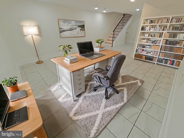 office area featuring light tile patterned flooring