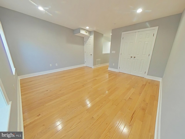 unfurnished room featuring light hardwood / wood-style floors