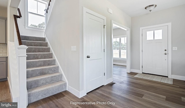 entryway featuring dark hardwood / wood-style floors