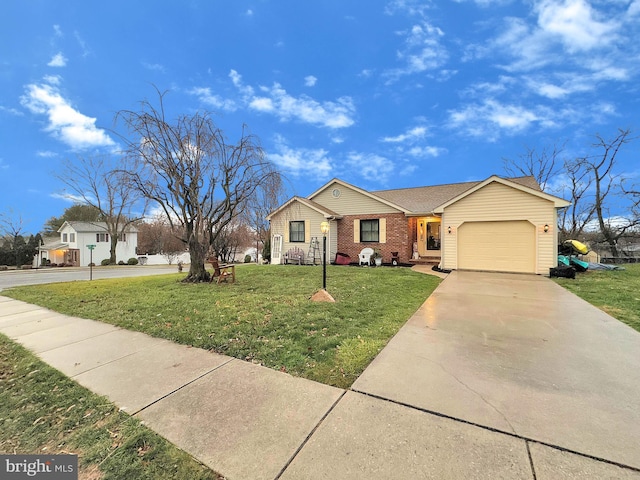 ranch-style house with a garage and a front lawn