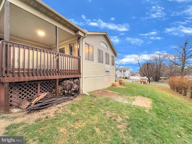 view of home's exterior with a lawn