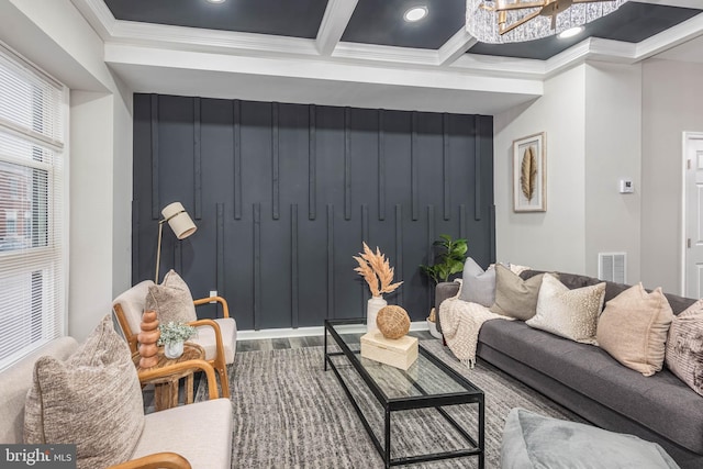 interior space with beamed ceiling, an inviting chandelier, crown molding, and coffered ceiling