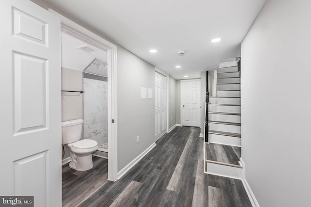 hall featuring dark wood-type flooring