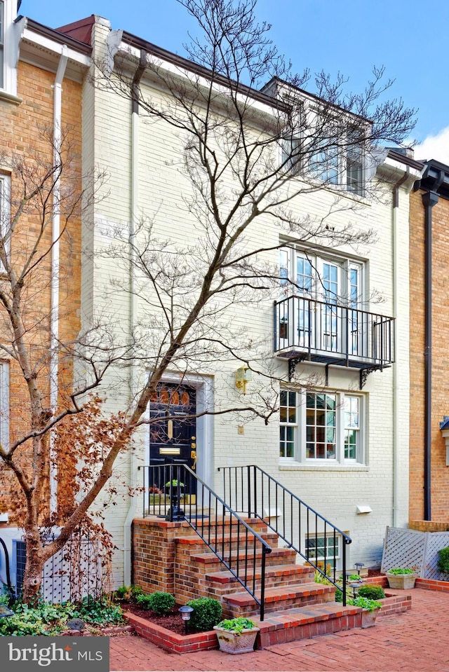 view of property featuring central air condition unit