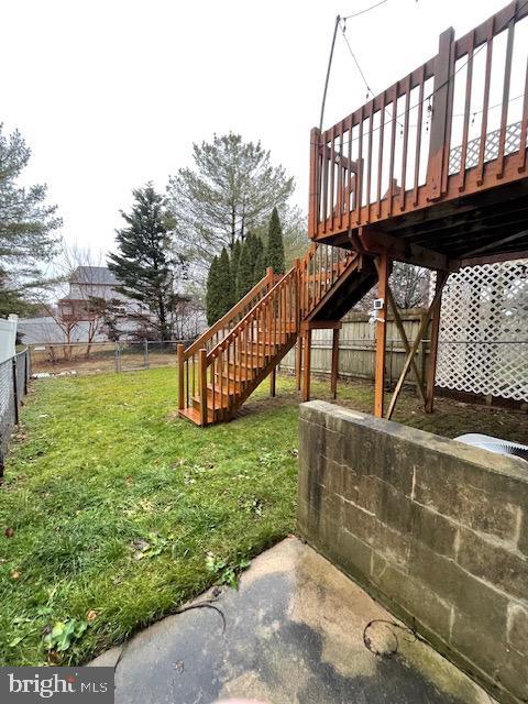 view of yard featuring a wooden deck