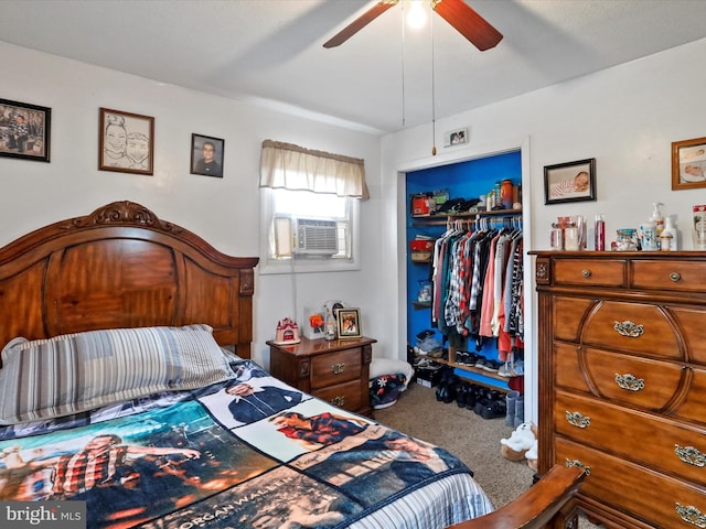 carpeted bedroom with ceiling fan, cooling unit, and a closet