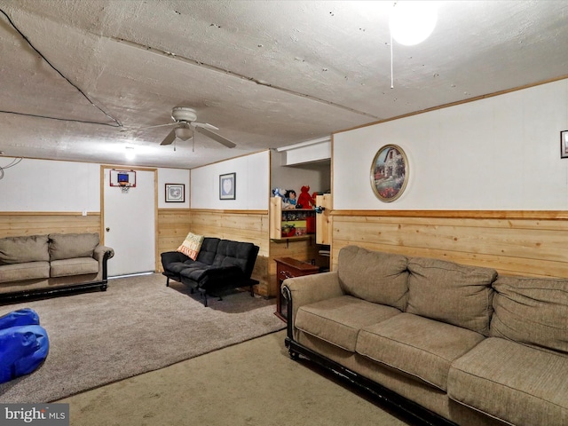 carpeted living room with wooden walls