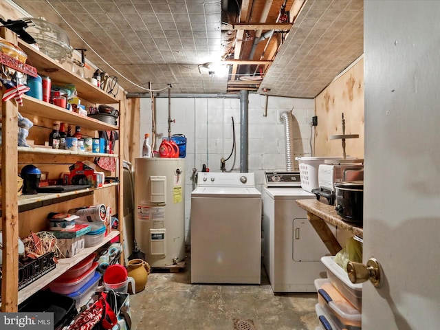 washroom featuring washer and dryer and water heater