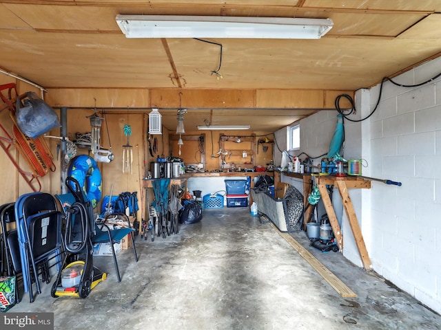 garage with a workshop area