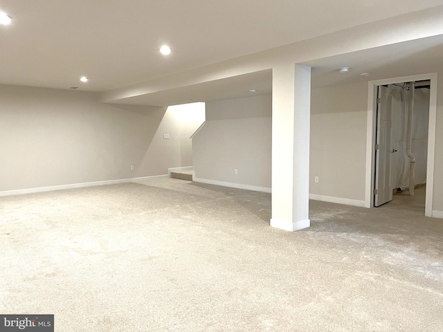 basement with light carpet