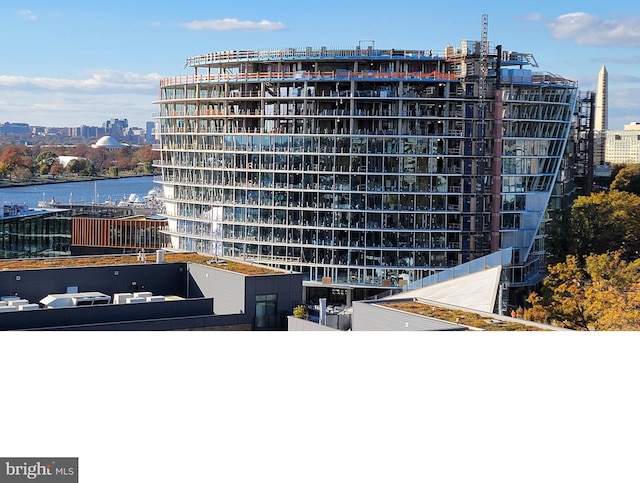 view of building exterior with a water view