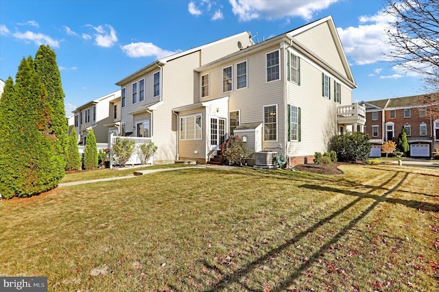 exterior space featuring a front lawn and cooling unit