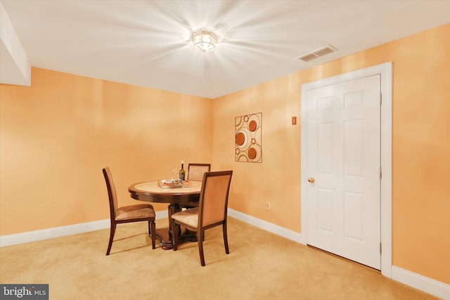 view of carpeted dining room