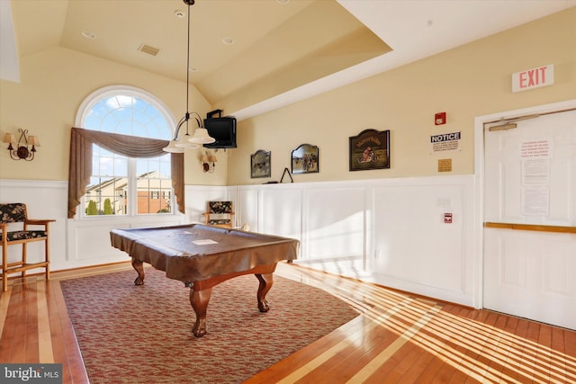 game room with wood-type flooring, vaulted ceiling, and pool table