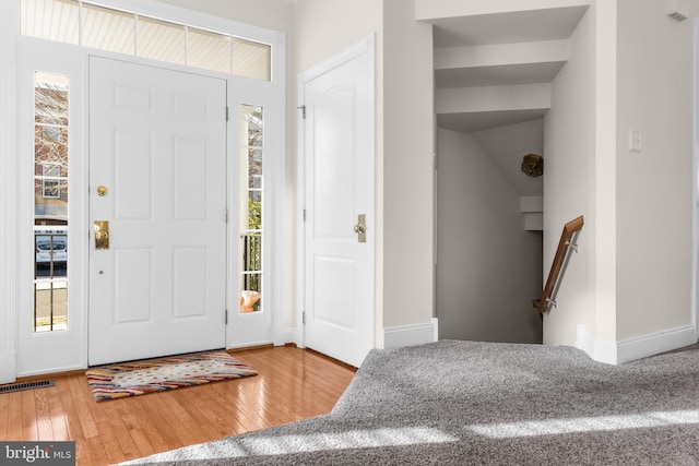 entrance foyer featuring hardwood / wood-style flooring